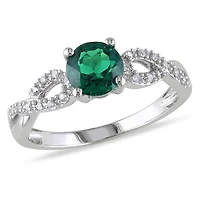 Tangelo 0.80 Carat T.G.W. Created Emerald and 0.10 Carat T.W. Diamond 10 K White Gold Cross-Over Ring
