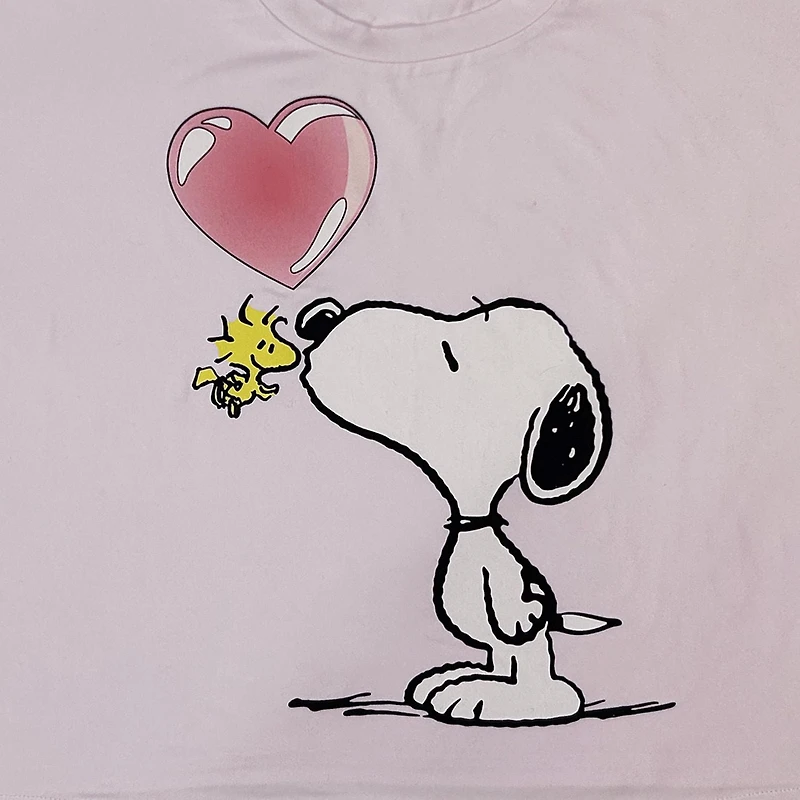 Peanuts Ladie's pyjama set. This 2 piece comfy pj set has a short sleeve boxy tee cropped top and long pant with elastic waist and draw string