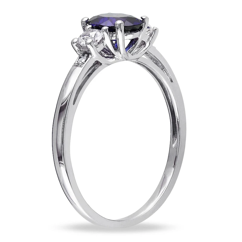 Tangelo 1-3/5 Carat T.G.W. Oval-Cut Created Sapphire and Diamond-Accent 10 K White Gold Three-Stone Ring