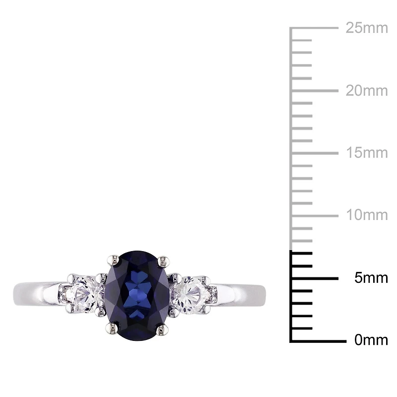 Tangelo 1-3/5 Carat T.G.W. Oval-Cut Created Sapphire and Diamond-Accent 10 K White Gold Three-Stone Ring