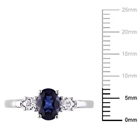 Tangelo 1-3/5 Carat T.G.W. Oval-Cut Created Sapphire and Diamond-Accent 10 K White Gold Three-Stone Ring