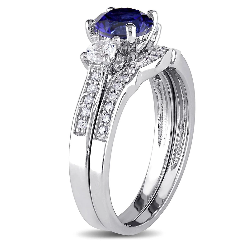 Tangelo 1.33 Carat T.G.W Created Blue and White Sapphire with 0.14 Carat T.W Diamond 10 K White Gold Three Stone Bridal Set