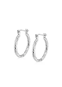 Luxury Designs Rhodium Plated Diamond Cut Oval Hoops