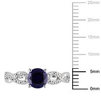 Tangelo 1 Carat T.G.W. Created Blue Sapphire and 0.10 Carat T.W. Diamond 10 K White Gold Cross-Over Ring