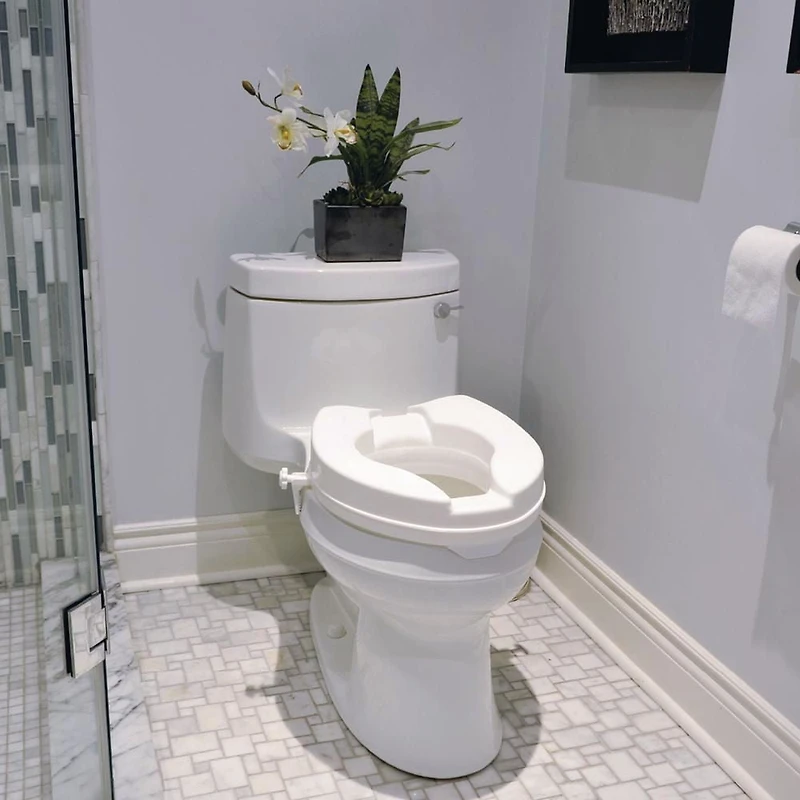 Siège de toilettes surélevé