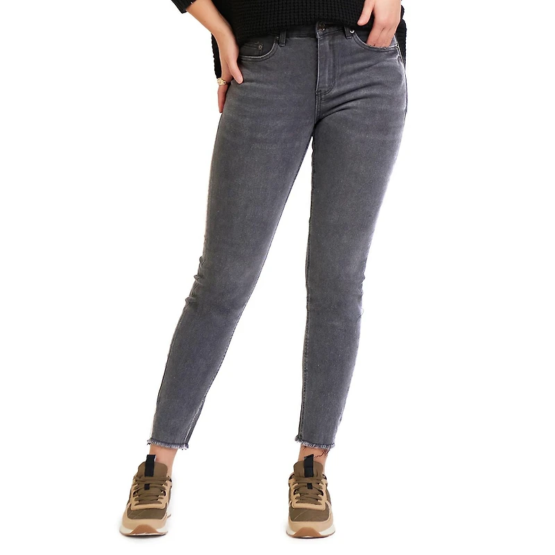 Skinny, 5-pocket, ankle length stretch denim jeans light blue wash.