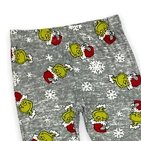 The Grinch Legging imprimé fille. Ces leggings longs pour filles ont une ceinture élastique et peuvent être portés avec n'importe quel haut et
