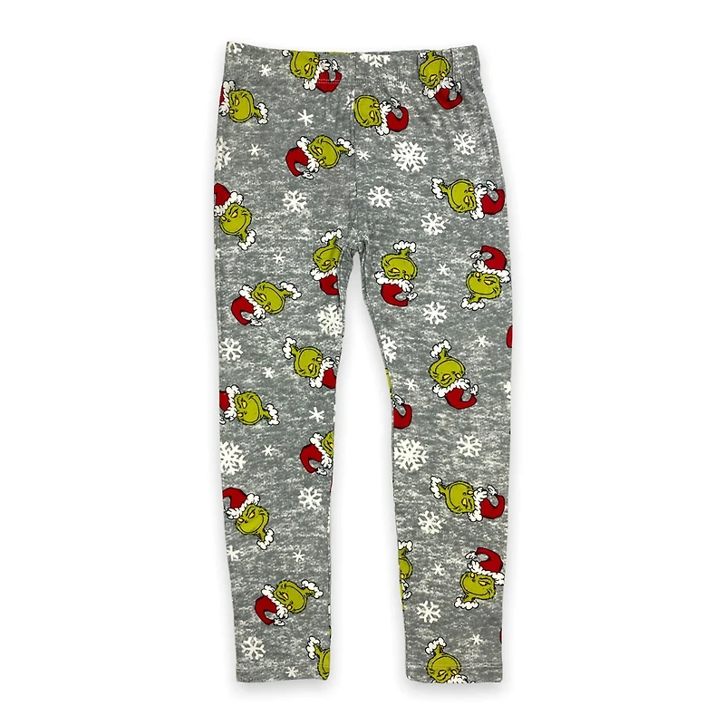 The Grinch Legging imprimé fille. Ces leggings longs pour filles ont une ceinture élastique et peuvent être portés avec n'importe quel haut et