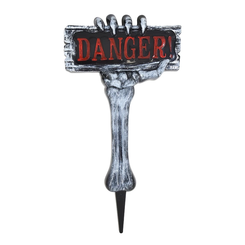 Piquet de jardin en plastique représentant une main de squelette pour Halloween, décorations d'extérieur, par Façon de célébrer <ul><li>Façon de célébrer Halloween sur le piquet de danger de la main du squelette</li><li>Décor extérieur sur le piquet de la cour d'Halloween</li><li>Le design présente une main de squelette tenant une pancarte indiquant « danger ! »</ li></ul>