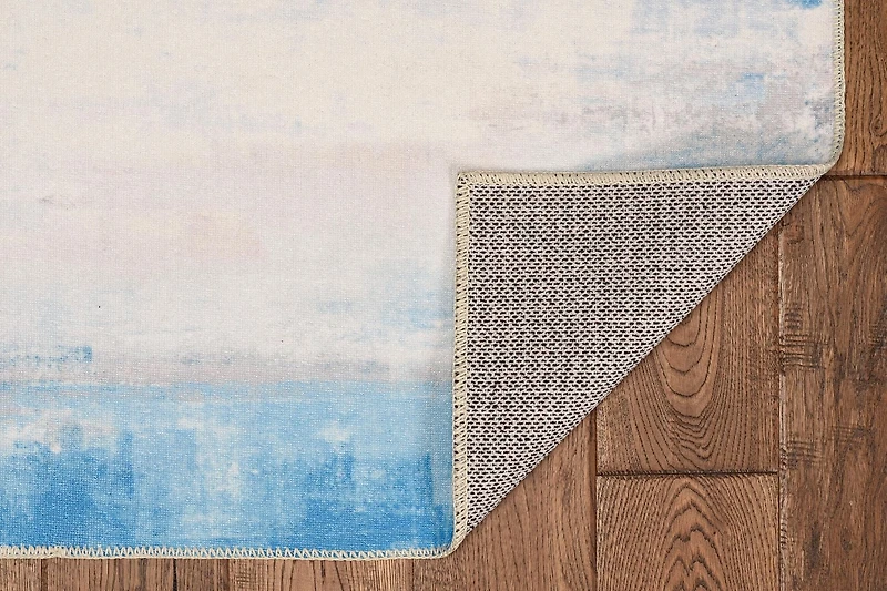 Tapis lavable Tiana 5 pi x 7 pi ivoire et bleu