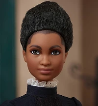 Poupée Ida B. Wells Femmes Inspirantes Barbie avec journal