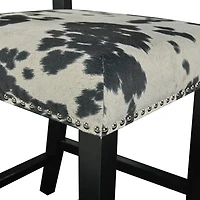 Tabouret de comptoir Noah imprimé vache noire