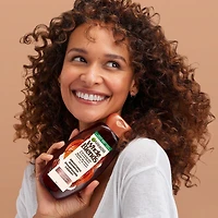 Garnier Whole Blends Revitalisant Lissant pour Cheveux Frisottés, à l'Huile de Noix de Coco & Beurre de Cacao, 650ml Revitalisant lissant pour cheveux frisottés