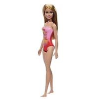 Beach Barbie Doll with Blond Hair Wearing Pink Palm Tree-Print Swimsuit