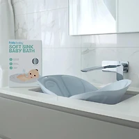 Frida Baby - Soft Sink Baby Bath - Easy To Clean Baby Bathtub + Bath Cushion That Supports Baby's Head - Quick Dry Material - Machine Washable