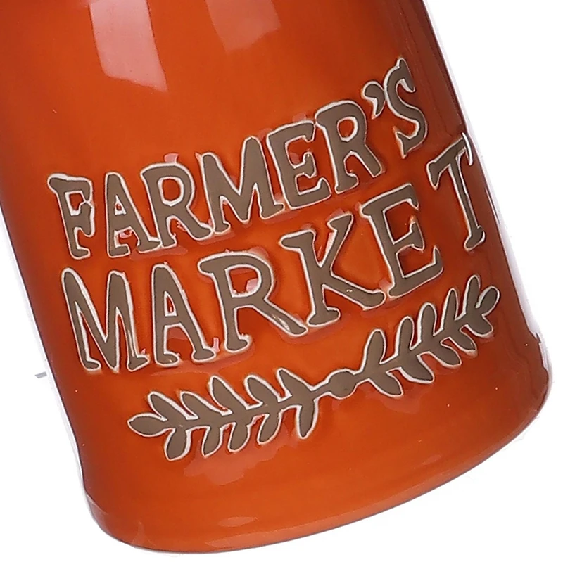 Pot orange avec fleur