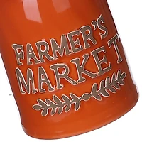 Pot orange avec fleur