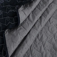 Couette réversible Mainstays Kids  dans un sac