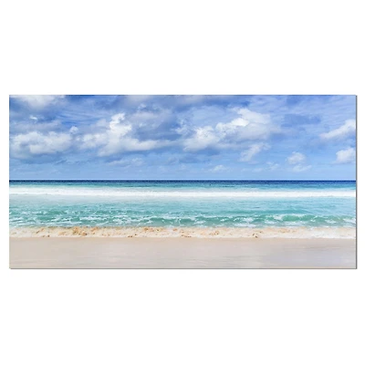 Designart Plage tranquille sous les nuages blancs Art mural sur toile