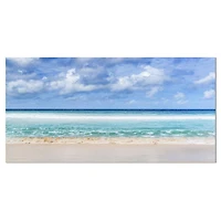 Designart Plage tranquille sous les nuages blancs Art mural sur toile
