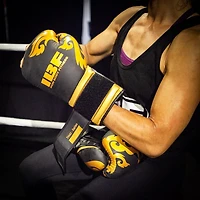 Gants de boxe serie thaï d'IBF - 12 once. - Noir et dorées