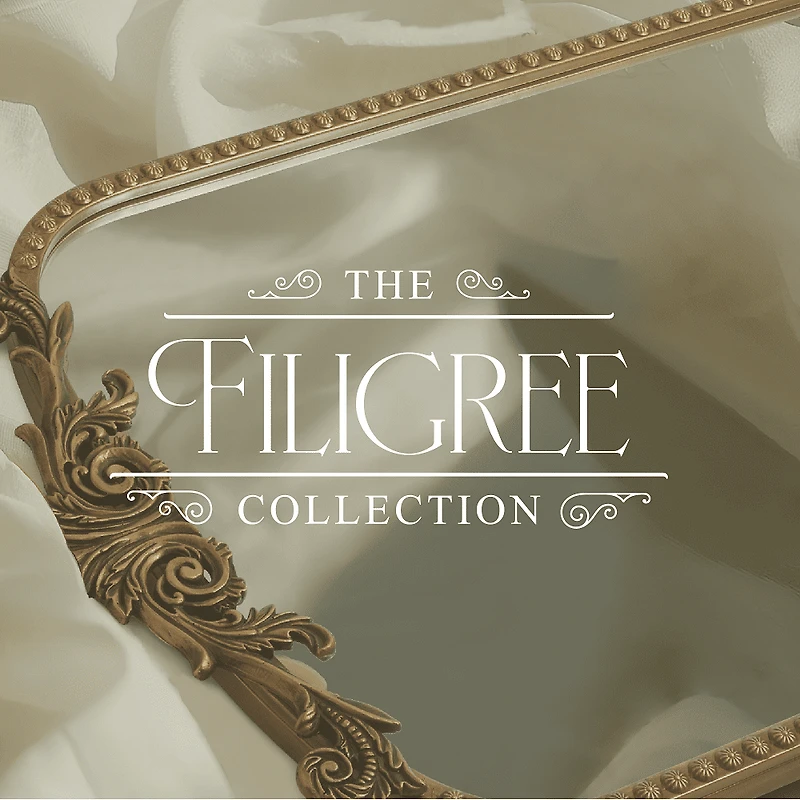 Crystal Art Gallery 20" x 30" Gold Filigree Arch Wall Mirror, With Frame <ul><li>Its classic design complements various interior themes from traditional to contemporary.</li><li>Not just a mirror but a piece of art that enhances the beauty of your space.</li><li>Built to last with high-quality materials ensuring stability and longevity.</li><li>Designed to lean</li></ul>