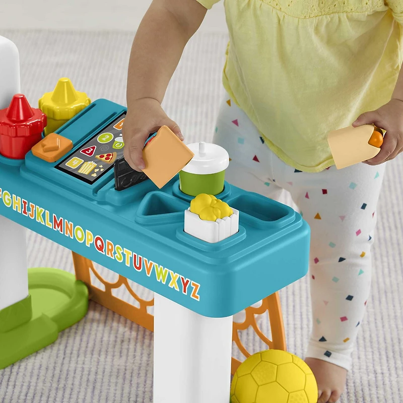 Fisher-Price Rires et Éveil Expérience de jeu 4 en 1, centre de jeux sportifs - Version Anglaise