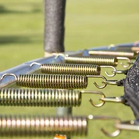 SKYWALKER TRAMPOLINES 10 FT, Round, Green Outdoor Trampoline for Kids with Safety Enclosure Net and Spring Pad, ASTM Approval, Rust Resistant