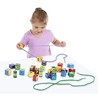 Melissa & Doug Laçage des perles dans une boîte