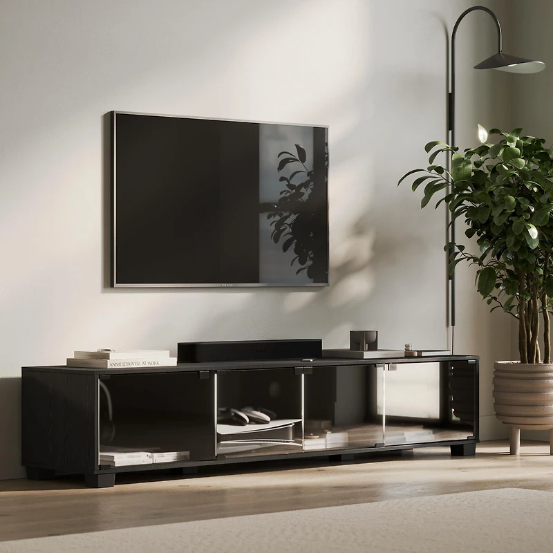 Bromley 71"L Black TV Stand with Four Glass Door Compartments