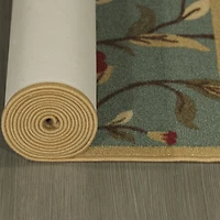 Tapis contemporain à motif de feuilles et à sous-couche en caoutchouc de la collection Ottohome