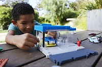Matchbox-Le Garage Matchbox avec 1 voiture