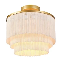 Plafonnier affleurant à 1 ampoule Janis de Novogratz x Globe, or mat, abat-jour en tissu frangé blanc