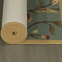 Tapis contemporain à motif de feuilles et à sous-couche en caoutchouc de la collection Ottohome