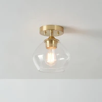 Plafonnier quasi affleurant à 1 ampoule Harrow, laiton mat, abat-jour en verre transparent