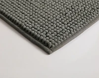 Tapis de bain en forme de nouille