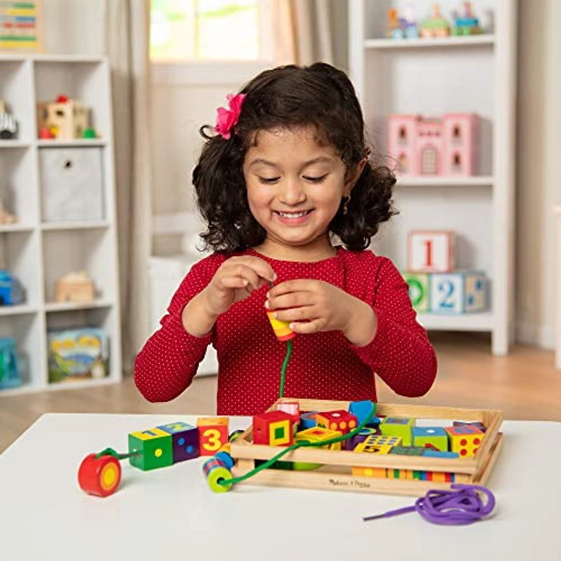 Melissa & Doug Laçage des perles dans une boîte