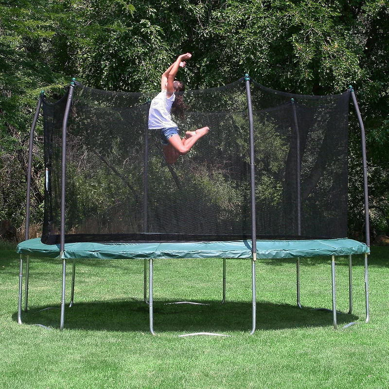 SKYWALKER TRAMPOLINES Trampoline d'extérieur rond vert de 4,5 m pour enfants avec filet de sécurité et coussin à ressorts, homologation ASTM, résistant à la rouille