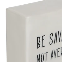 Plaque carrée de table en porcelaine "Be Savage Not Average" Linden de Hometrends