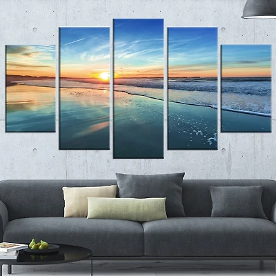 Design Art Blue Seashore with Distant Sunset Seashore Canvas Wall Art