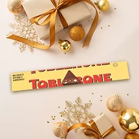 Tablette de chocolat au lait TOBLERONE avec nougat au miel et aux amandes 100 g