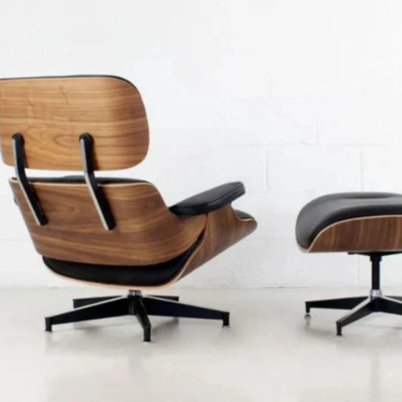 Fauteuil East Lounge II et pouf en noir