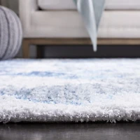 Safavieh Saffron Corynn Geometric Area Rug