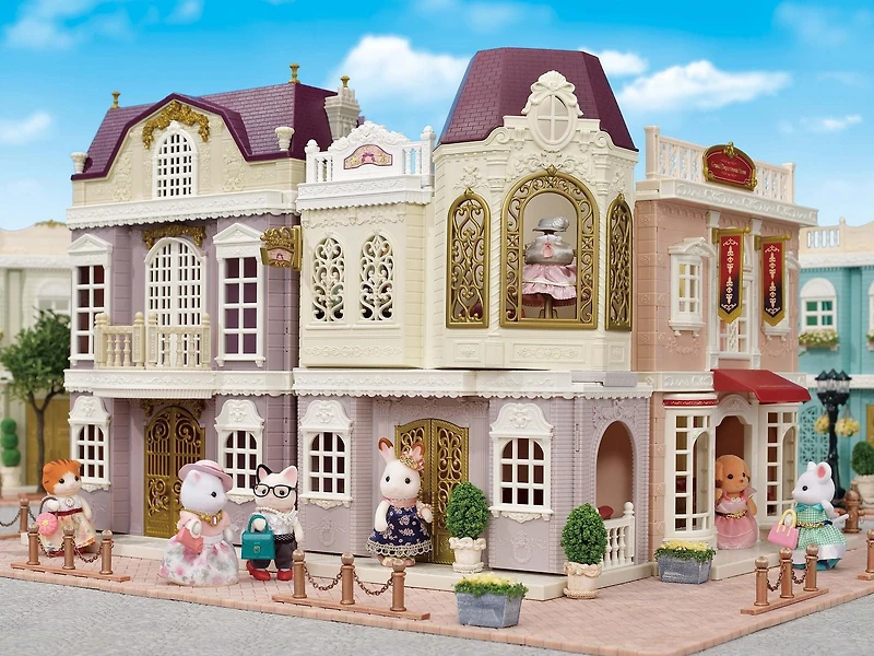 Calico Critters Boutique de Mo Maison de Poupée avec Figurine et Accessoires de Mode