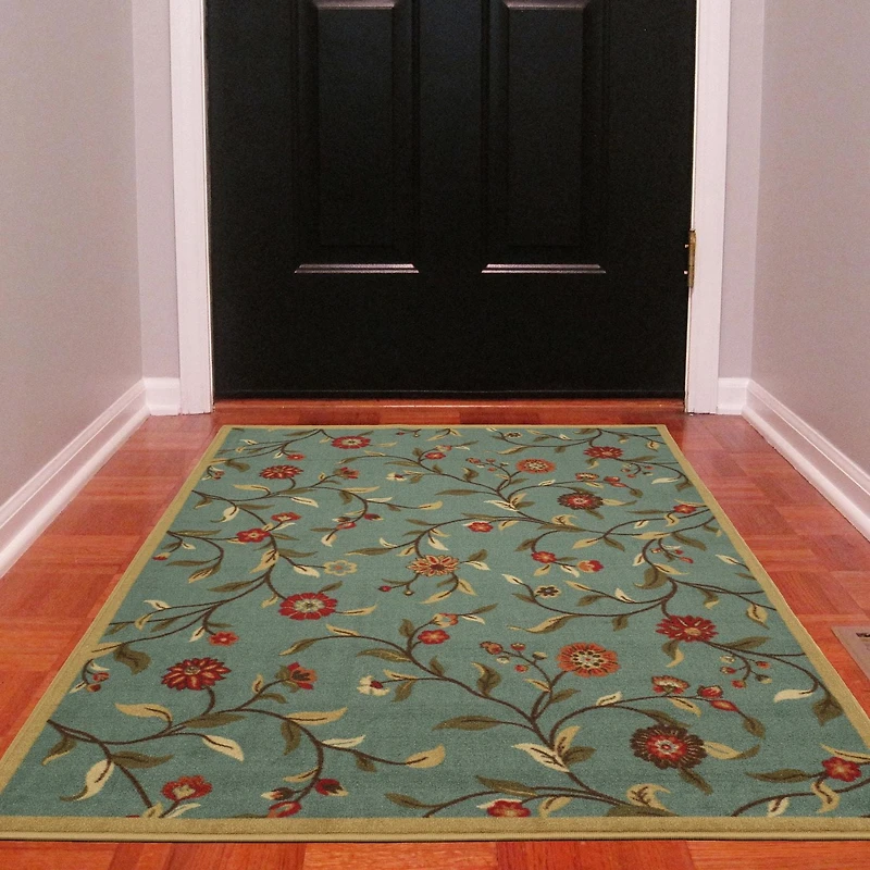 Tapis contemporain à motif de feuilles et à sous-couche en caoutchouc de la collection Ottohome