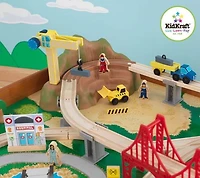 KidKraft Ride Around Town Wooden Train Set and Table with Storage Bins and 100 Pieces, Honey
