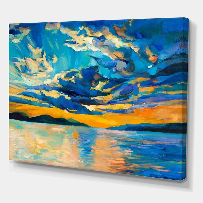 Designart Nuageux grand ouvert coucher de soleil sur l'horizon de l'océan Art mural sur toile