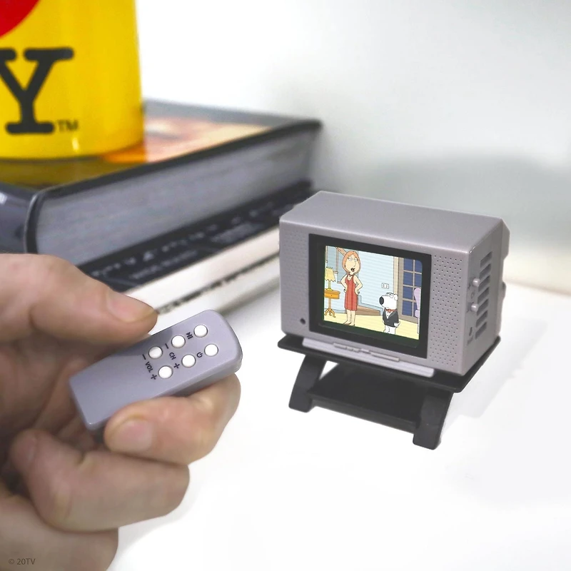 Tiny TV Classics - Family Guy Edition- Newest Collectible from Basic Fun - Watch top Family Guy scenes on a real-working Tiny TV (with working remote)!