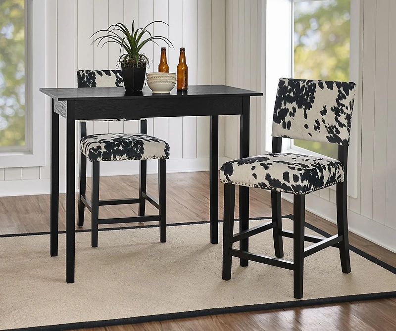 Tabouret de comptoir Noah imprimé vache noire