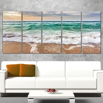 Tableau mural sur toile Design Art Bord de mer Vagues écument d'un bleu cristal